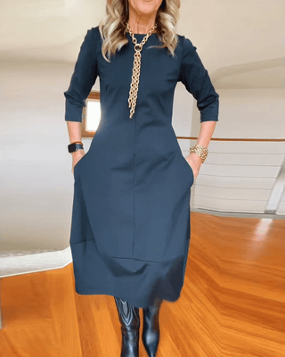 Ulyssa – Elegant Midi Dress with Subtle Pleats