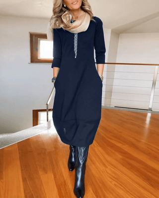 Ulyssa – Elegant Midi Dress with Subtle Pleats